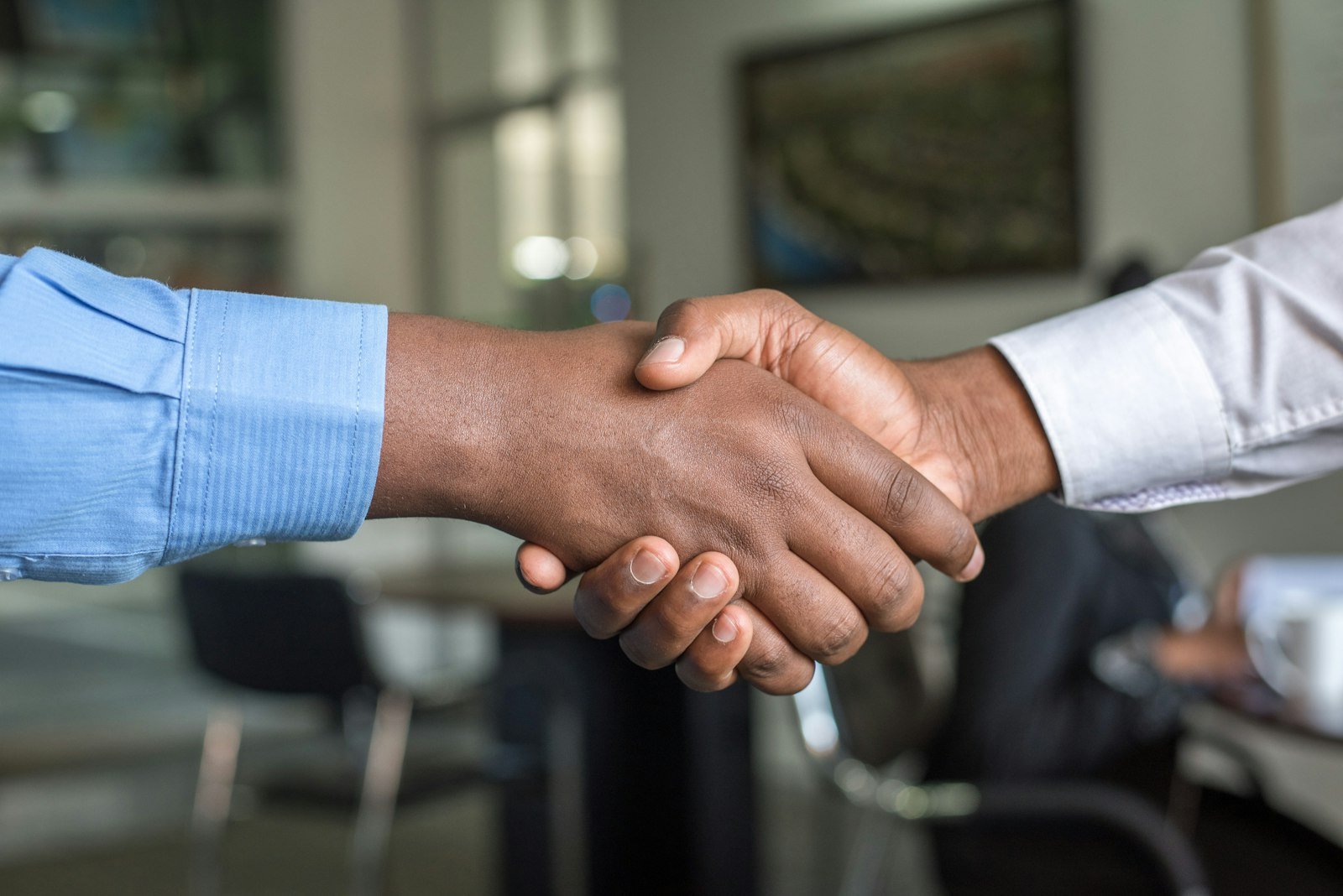 Business handshake representing a completed search