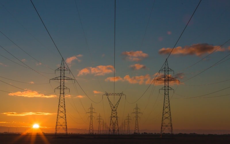 Power grid infrastructure at sunset